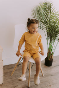 Grow-with-me yellow t-shirt with pear print