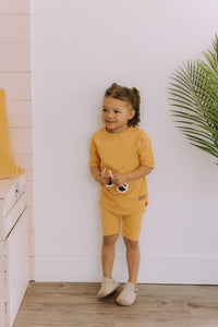 Grow-with-me yellow t-shirt with pear print
