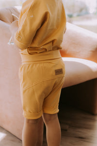 Grow-with-me yellow shorts