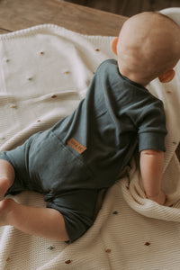 Grow-with-me pastel blue ribbed bamboo short onesie