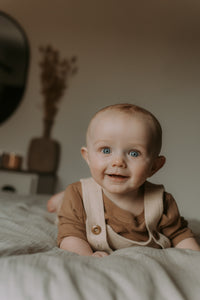 Grow-with-me cream ribbed bamboo short overall