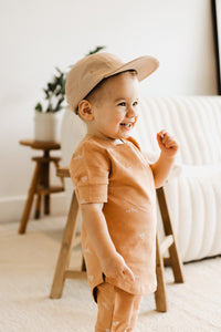 Evolutive burnt-orange patterned t-shirt