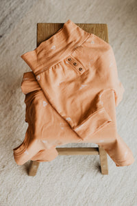 Short/capri évolutif orange brûlé avec motifs