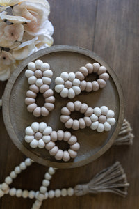 Ivory/beige flower teething toy